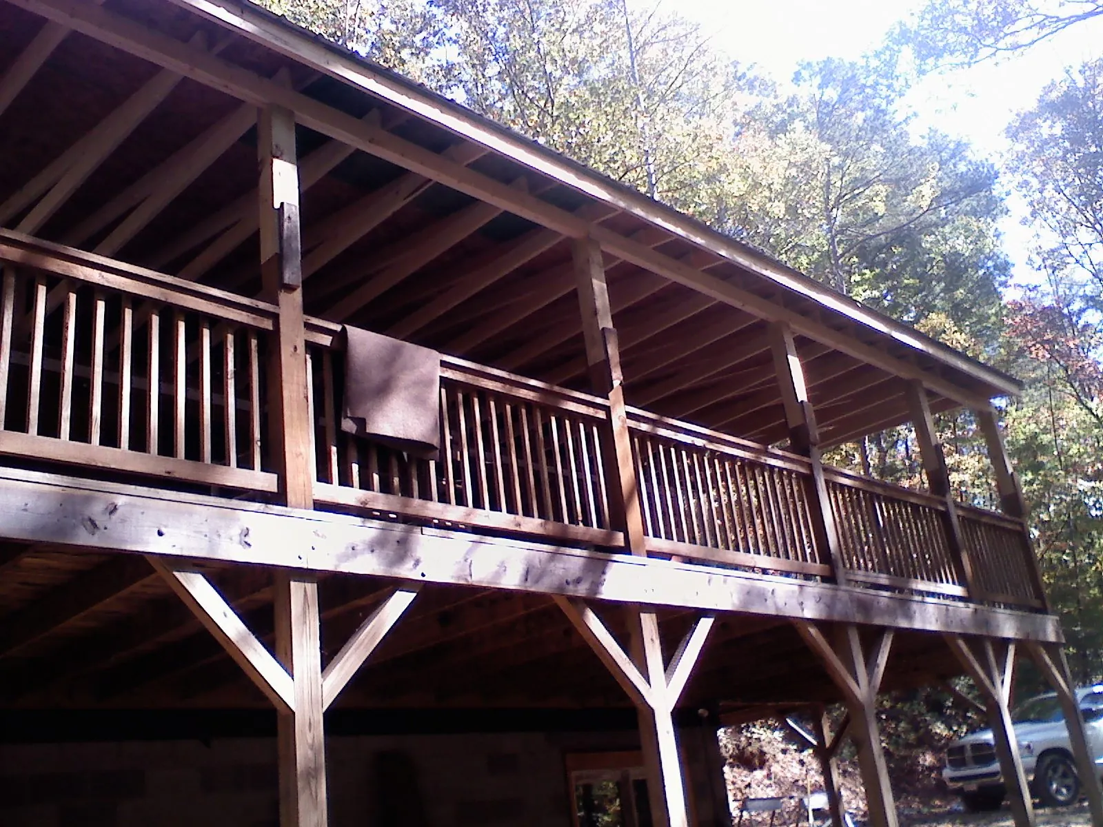 Timber framing under a new elevated porch and deck — Roof Leak Repair in Summersville by Roofing Brothers